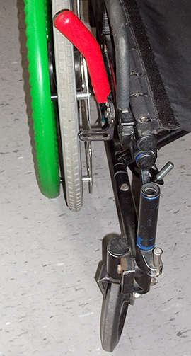 Extension de frein manuel pour fauteuil roulant